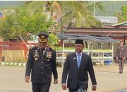 Hadiri HUT Bhayangkara, Bupati Ubaid Turut Inspeksi Pasukan Upacara